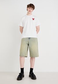 Levi's® VINTAGE FIT GRAPHIC - Marškinėliai su spaudiniu - bi eagle white