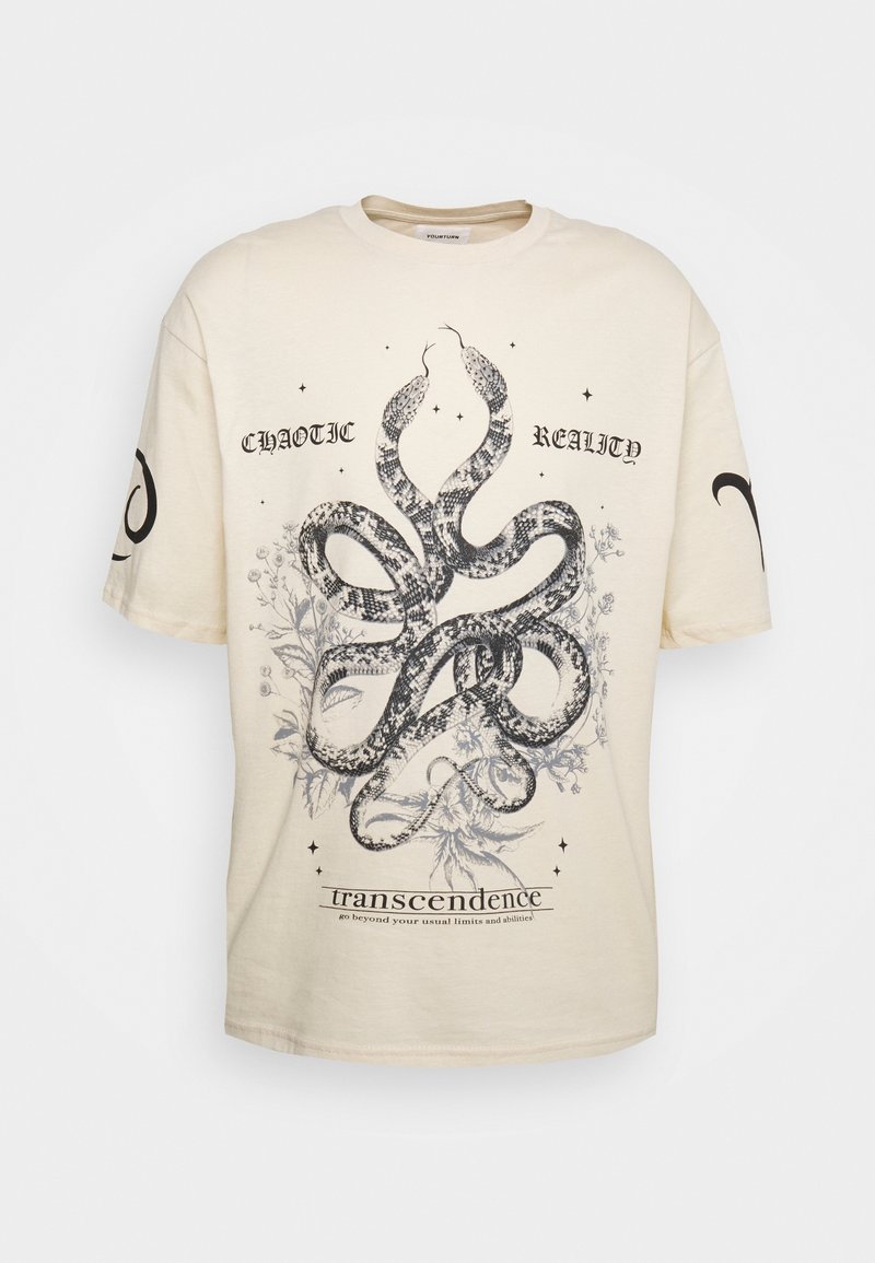 Cream-colored cotton t-shirt featuring a black snake graphic surrounded by floral elements and text, with short sleeves and a relaxed fit.
