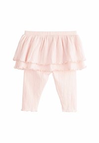Ljust rosa outfit med ett volangblus i två lager och matchande åtsittande leggings med ett strukturerat randmönster.