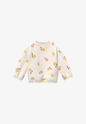 Biała bluza z długim rękawem z wzorem uśmiechniętych żółtych cytryn i pomarańczowych brzoskwiń z zielonymi liśćmi.