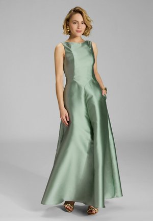 Langes A-Linien-Kleid aus satinartigem Stoff in einem hellgrünen Farbton, ohne Ärmel und mit praktischen Seitentaschen.