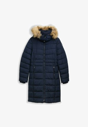 Piumino blu navy con cappuccio in pelliccia sintetica rimovibile, design trapuntato, due tasche laterali con zip e chiusura frontale con zip.