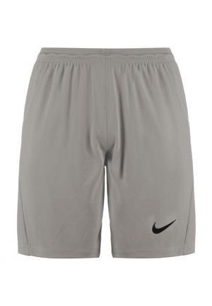 Short de sport gris clair avec taille élastique et logo Nike Swoosh noir sur la partie inférieure de la jambe gauche.