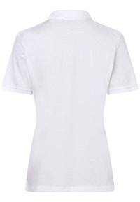 Witte polo met korte mouwen, voorzien van een kraag, gladde katoenstof en een aansluitend ontwerp met een rechte zoom. Geen zichtbare patronen of accenten.