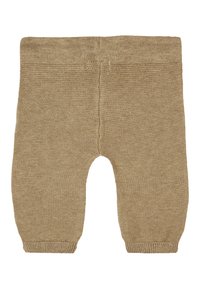 Gebreide kinderbroek in een lichtbruine kleur, met een elastische tailleband en geribde manchetten, en een open ruimte voor gemakkelijke beweging.