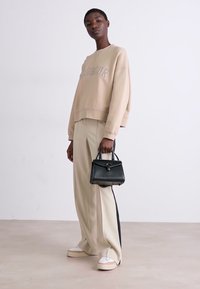 COACH LUXE REFINED SAMMY TOP HANDLE - Sac à main - black