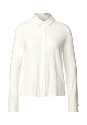Chemise à manches longues, à boutons, de couleur blanche, avec un col classique, une texture douce et une coupe ajustée. Disponible avec des boutons à l'avant et des poignets.