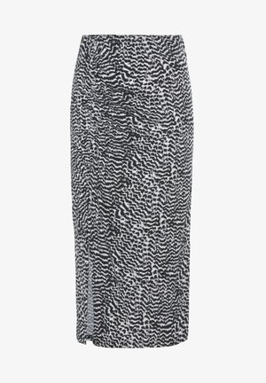 Sorte og hvide blyantnederdel med et abstrakt bølge mønster, lavet af strækbart stof, med en sideslids og en tætsiddende silhuet.