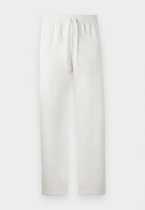 Weiße Jogginghose aus weichem Material, mit elastischem Bund und Kordelzug, geraden Beinen und ohne sichtbare Muster oder Akzente.