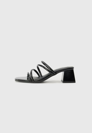 Heeled mules - black