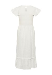 White midi dress with short flutter sleeves, a smocked bodice, and layered ruffle hem. Features a leaf pattern with cut-out details.