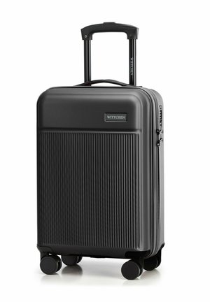 Schwarzer Hartschalenkoffer mit strukturiertem Rillen-Design, ausziehbarem Griff und vier leichtläufigen Rollen für mühelose Manövrierbarkeit.