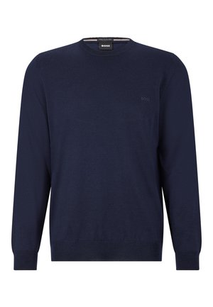 Pull marin à col rond en tissu tricoté lisse avec des manches longues. Présente un logo discret sur la poitrine et des bords côtelés aux poignets et à l'ourlet.