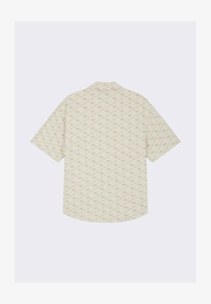 Chemise à manches courtes crème avec un motif à losanges subtil. Caractéristiques : col classique et coupe décontractée. Texture de tissu douce.