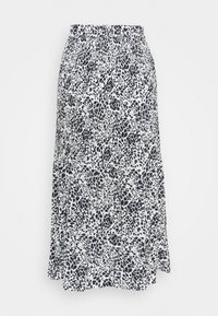 Sort og hvid dyreprint plisseret midi skirt med elastisk talje på en ensfarvet baggrund.