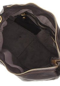 Borsa a mano in pelle marrone con finitura morbida, zip dorata e tasche interne. L'interno presenta un rivestimento in morbido tessuto grigio.