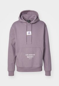Felpa viola con cappuccio, dotata di una tasca frontale, un patch con logo e la scritta "LOS ANGELES LAKERS" stampata in bianco.