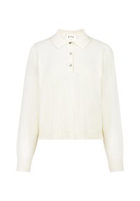 Maglione lavorato a maglia color crema con collo a camicia, patta con tre bottoni e polsini a costine. Presenta una vestibilità rilassata e cropped.