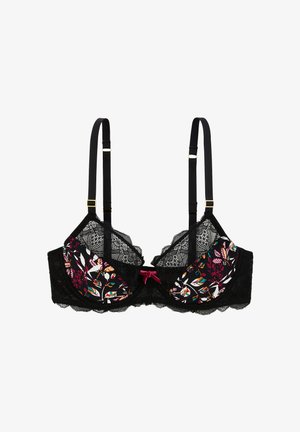 Soutien-gorge en dentelle noire avec des bonnets à motif floral et des accents roses et bleus. Bretelles réglables et un nœud décoratif rose au centre.
