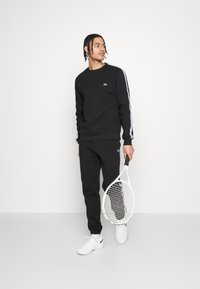 Lacoste Sport TAPERED - Sweatshirt - black
