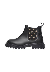 Bottines Chelsea en cuir noir avec un panneau élastique texturé sur le côté, orné de petits cœurs dorés. Semelle en caoutchouc robuste avec un motif à crampons.