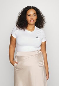 Calvin Klein Jeans MONOLOGO SLIM TEE 2 PACK - T-shirt básica - tawny sand/bright white