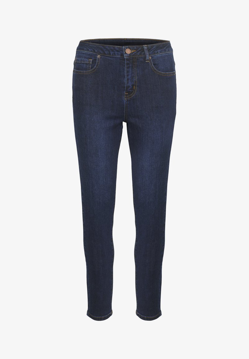 Tamsiai mėlynos aptemptos džinsinės kelnės turi lygią džinsinio audinio tekstūrą, standartines kišenes ir priekinį užsegimą su mygtuku. Siūlės yra kontrastingos geltonos spalvos.