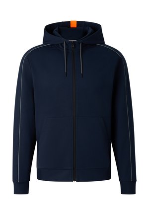Granatowa bluza z kapturem na zamek, z przednimi kieszeniami, kapturem ze sznurkiem, subtelnym białym obszyciem na rękawach oraz pomarańczową metką z tyłu kaptura.