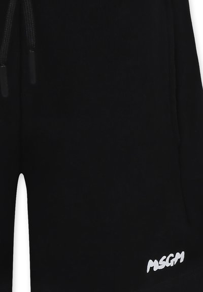 Pantaloni corti neri in cotone con cintura elastica e lacci neri. Presentano il logo MSGM bianco sul lato sinistro in basso. Texture liscia.