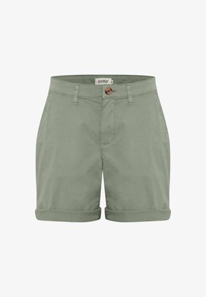 Light green cotton shorts with rolled cuffs, a front button closure, and two side pockets. Features a plain texture and stitched detailing.