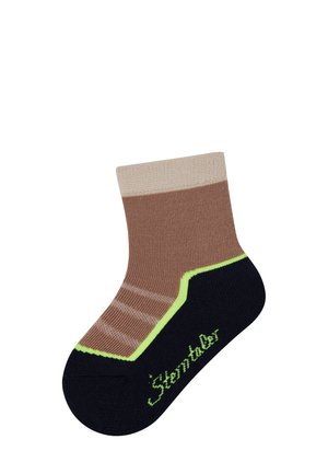 Brown and tan sock with a ribbed texture, featuring a green accent pattern and navy blue sole. Brand name stitched on the side.
