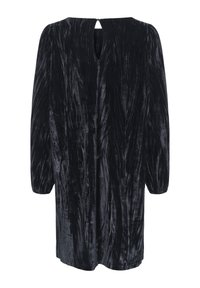 Rochie din catifea neagră cu mâneci lungi, suprafață texturată și deschidere tip cheie în spate. Se termină la mijlocul coapsei, cu un croi lejer.