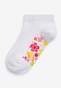 Calcetín blanco hasta el tobillo con patrones florales coloridos en rosa, rojo y amarillo. Puño acanalado con una textura suave, adecuado para un estilo casual.