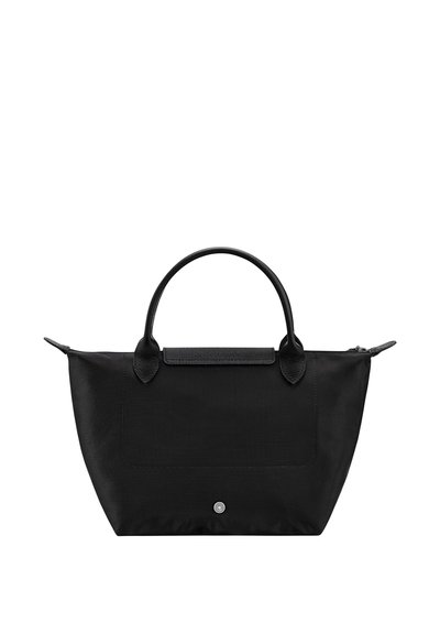 Black handbag with rounded handles, rectangular flap, and zippered top closure, displayed against a white background.