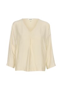 Blusa color crema con scollatura a V e maniche a tre quarti. Tessuto morbido e testurizzato con una vestibilità rilassata e un delicato dettaglio plissettato all'escursioner.