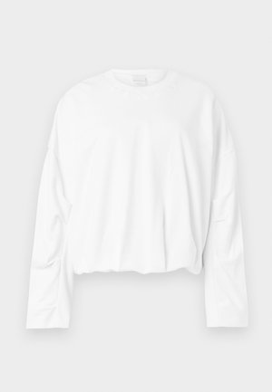 White, long-sleeve cropped sweatshirt with a round neckline and soft cotton material. Features slight gathering at the waist and a smooth texture.