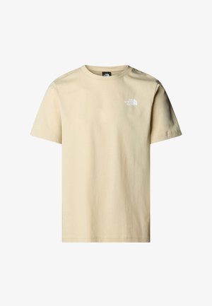 Camiseta de algodón color beige claro con cuello redondo. Presenta un pequeño logo de color blanco impreso en el lado izquierdo del pecho. Manga corta y un corte relajado.