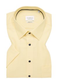 Geel, gestreept overhemd met een moderne pasvorm, voorzien van een spread collar, zwarte knopen en een borstzak. Label leest "Eterna."