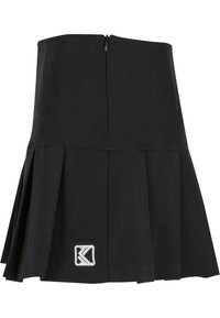 Svart plisserad kjol i en blandning av bomull. Har en dold dragkedja bak och en liten broderad logotyp vid fållen.