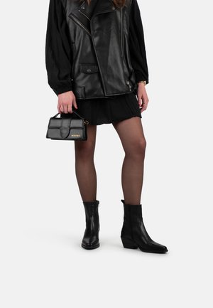 INDIE - Classic ankle boots - black with animal print