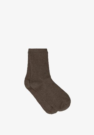 Braune, gerippte Socken mit weicher Textur, die eine normale Höhe und ein schlichtes Design aufweisen. Hergestellt aus Strickstoff für Komfort.