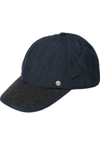 Quilted navy cap with a textured dark gray curved brim and a small round silver emblem on the side.