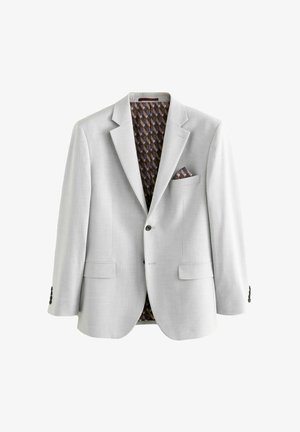 Gaiši pelēks žakets ar klasisku dizainu, divām priekšējām kabatām un rakstainu brūnu iekšpusi. Iezīmē melni pogu akcenti un kabatas lakatiņš.