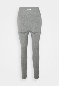 Leggings grigi con una texture liscia, dotati di una vita alta e di un piccolo logo in alto. Il design è aderente e privo di motivi.