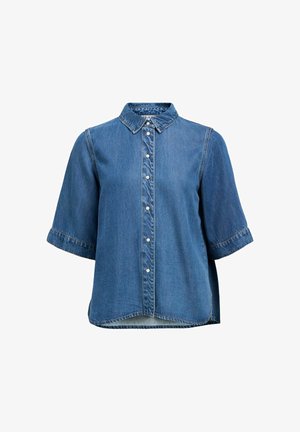 Teksariidest lühikeste varrukatega nööbitav särk krae ja pärlmutterklambritega, millel on veidi kaarduväärne hem.