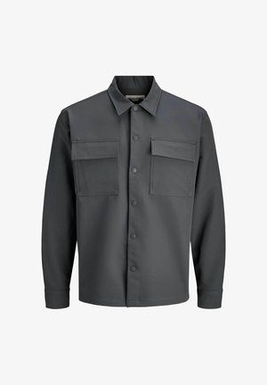 Tummaharmaa pitkähihainen takki, jossa on kaulus, etupainonapit ja kaksi suurta läppiä rintataskuissa.