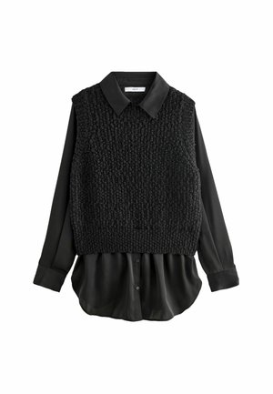 Stickad tröja - black