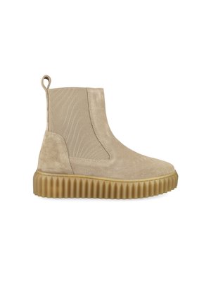 Beige suede ankle boot with elastic side panel, pull tab at the back, and thick ridged gum sole for traction.