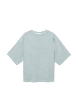 T-shirt oversized di colore azzurro chiaro realizzato in tessuto morbido, con scollatura rotonda e maniche corte a raglan, dal tessuto liscio e dal design semplice.