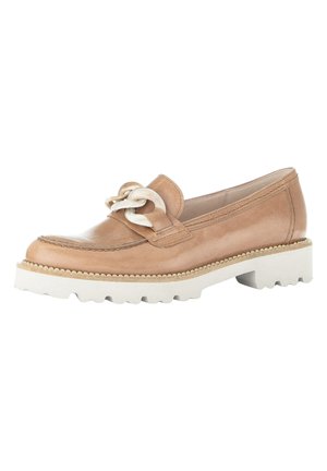 Tan leather loafer with a chain accent, featuring a white chunky sole and textured stitching along the edge. Smooth finish, practical design.